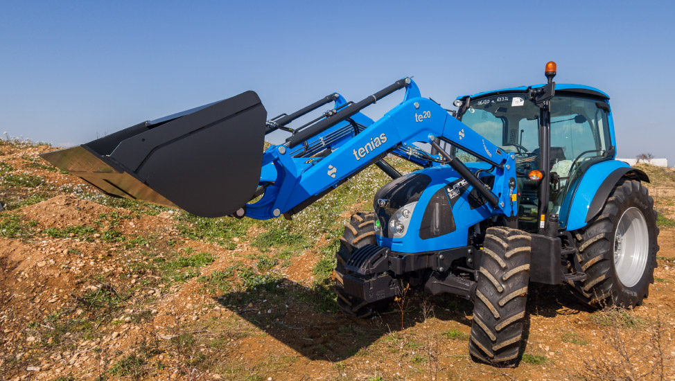 Blue evolution front loader mounted on a tractor
